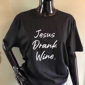 District tee with “Jesus drank wine” on it.